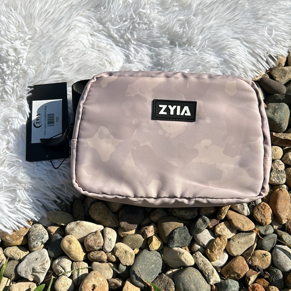 ZYIA Handbags - ZYIA Active Pink Camo Crossbody Bag
NEW with bag and tag!
